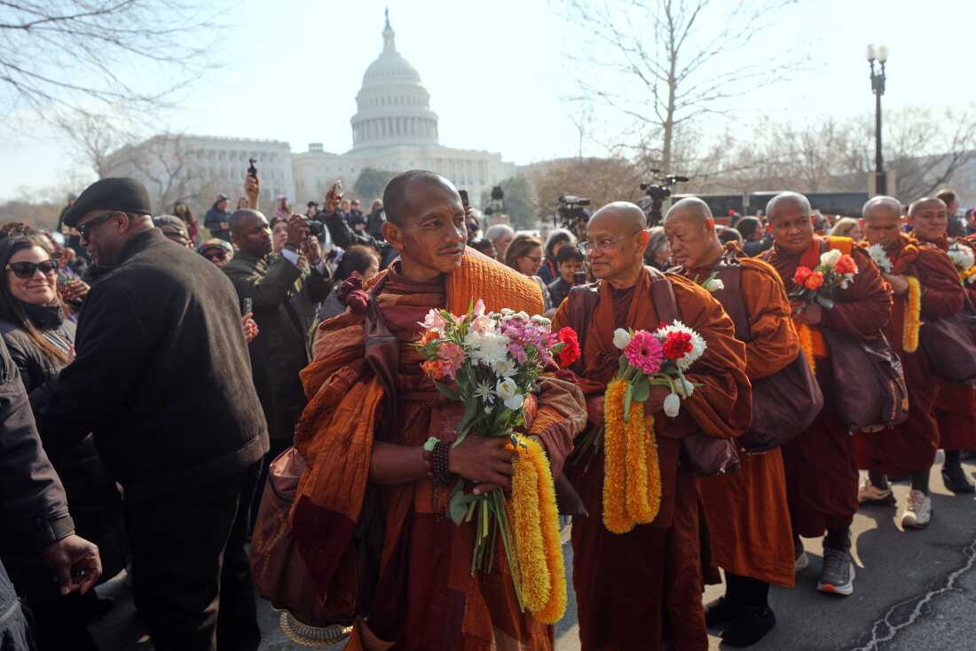 Buddhist monks walk near the U.S. Capitol, on Capitol Hill, during their Walk For Peace.