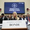 Attorney General Pam Bondi takes her seat before testifying before the House Judiciary Committee on Feb. 11. 