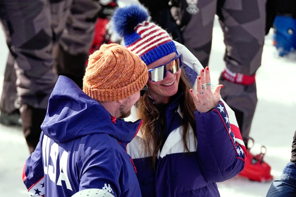 United States' Breezy Johnson looks at the engagement ring she was given by Connor Watkins, at...