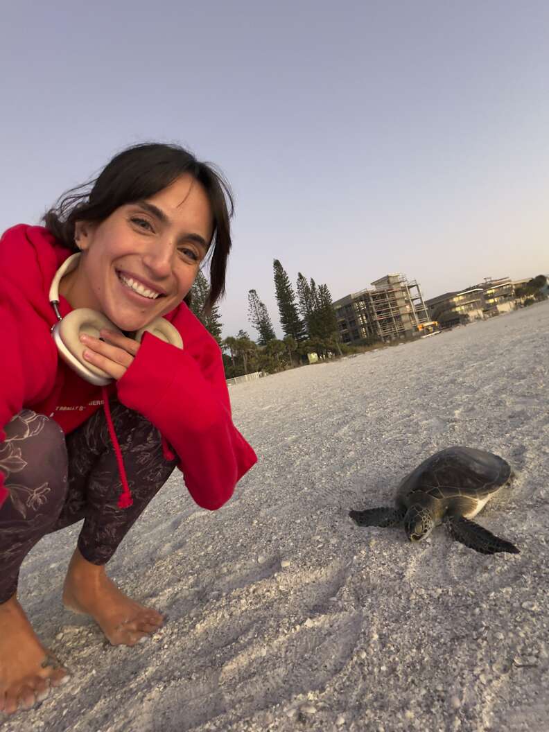 woman with a sea turtle