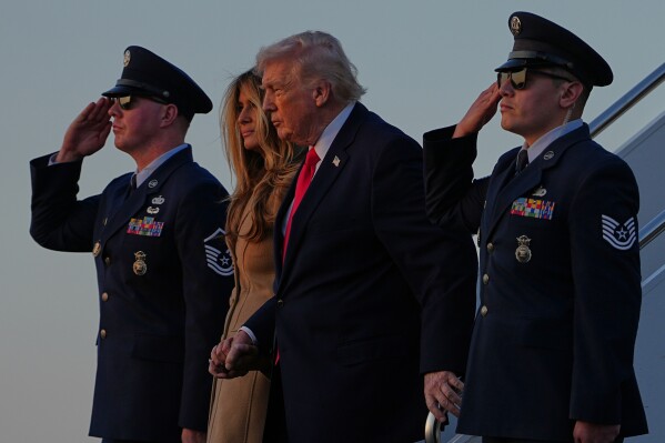 President Donald Trump and first lady Melania Trump arrive on Air Force One at Palm Beach International Airport in West Palm Beach, Fla., Feb. 13, 2026. (AP Photo/Matt Rourke, File)