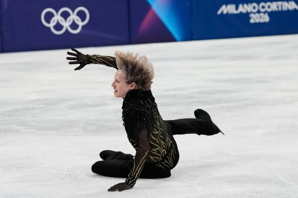 Ilia Malinin of the United States falls during the men's free skate program in figure skating at the 2026 Winter Olympics, in Milan, Italy, Feb. 13, 2026. (AP Photo/Natacha Pisarenko, File)