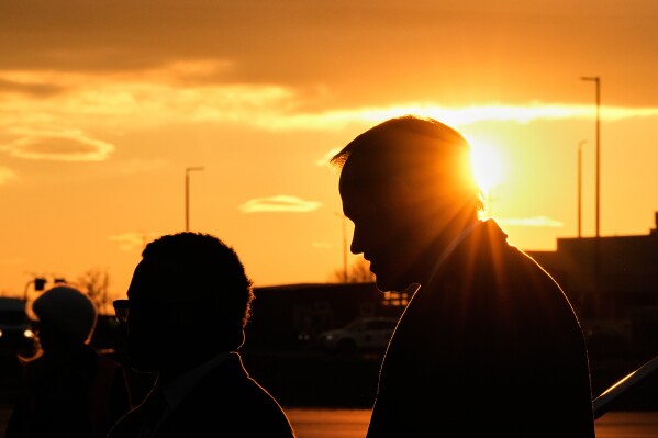 U.S. Secretary of State Marco Rubio, silhouetted against the setting sun, arrives at the Liszt Ferenc International Airport in Budapest, Hungary, Feb. 15, 2026. (AP Photo/Alex Brandon, File)