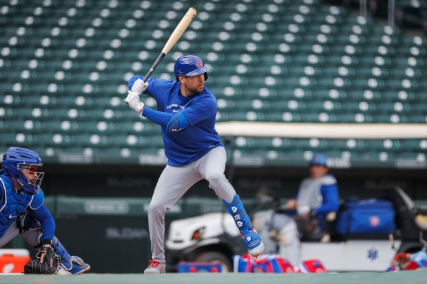 Cubs outfielder Dylan Carlson takes live batting practice during a spring training workout at Sloan Park on Feb. 18, 2026, in Mesa, Ariz. (Armando L. Sanchez/Chicago Tribune)