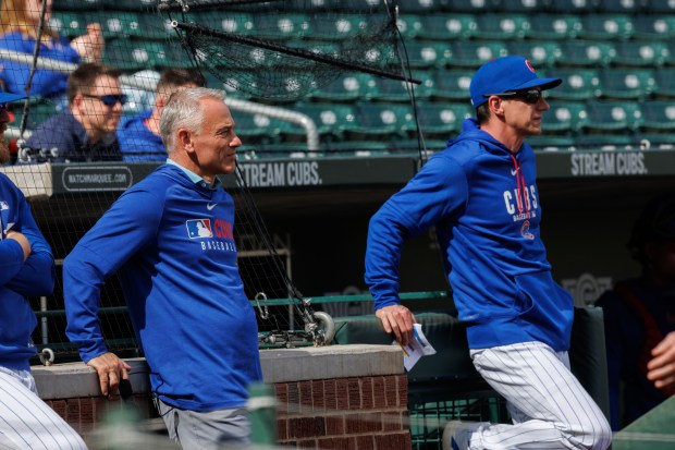 President Jed Hoyer and manager Craig Counsell watch players during batting practice at spring training at Sloan Park on Tuesday, Feb. 17, 2026, in Mesa, Ariz. (Armando L. Sanchez/Chicago Tribune)