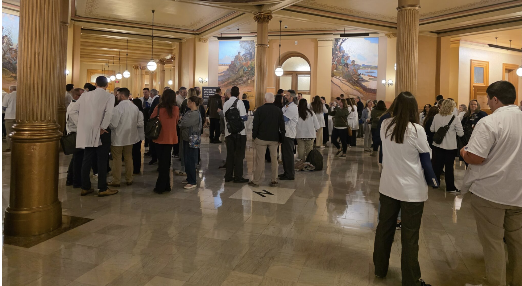 Hundreds of pharmacists from across Kansas descend on the Kansas Capitol on Feb. 4, 2026, to support a Kansas Senate bill that advocates are convinced will give state officials more tools to to regulate pharmacy benefit managers. The bill was approved Wednesday by the Senate and forwarded to the Kansas House. (Photo by Morgan Chilson/Kansas Reflector)