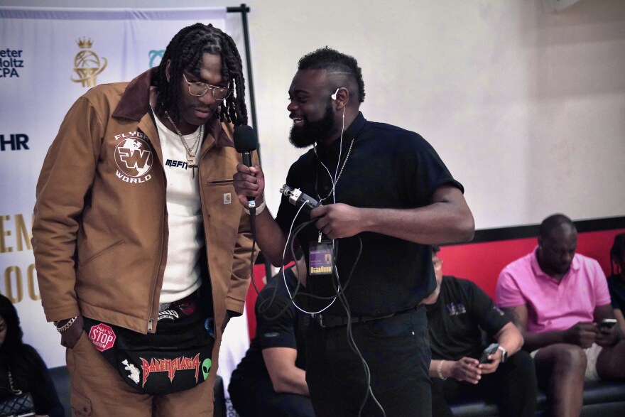 Demetrius Johnson interviewing Kevon Looney at the WPBA All Star Game.