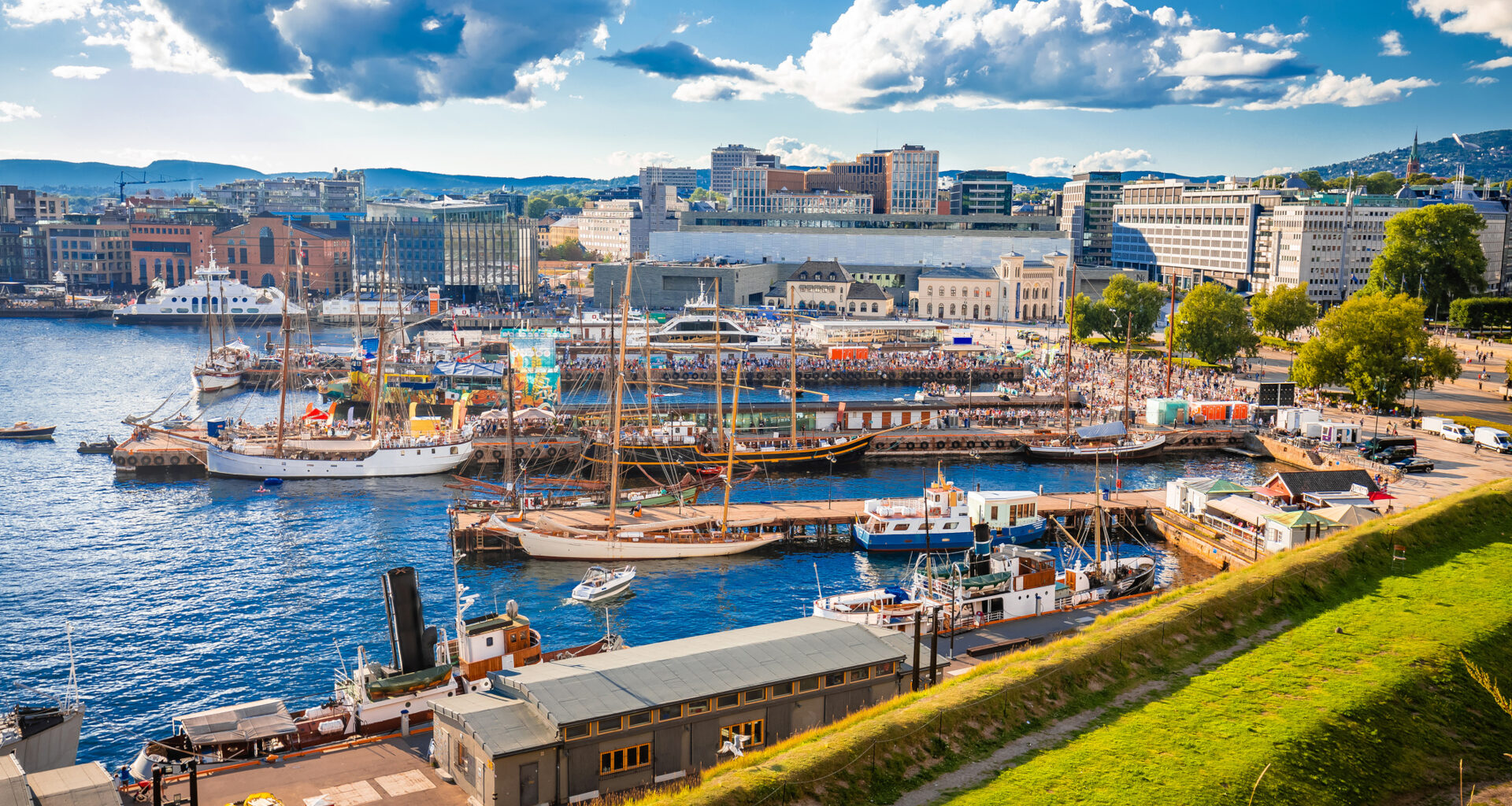 Scenic harbor of Oslo in Aker Brygge view from the hill, capital city of Norway.