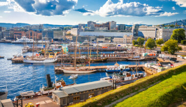 Scenic harbor of Oslo in Aker Brygge view from the hill, capital city of Norway.