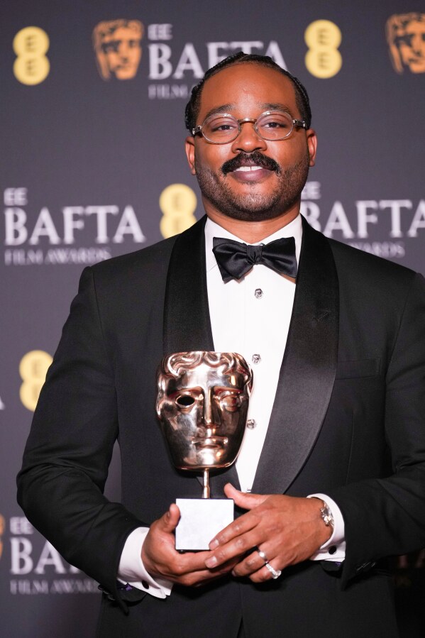 Ryan Coogler poses with the award for original screenplay for 'Sinners' at the 79th British Academy Film Awards, BAFTA's, in London, Sunday, Feb. 22, 2026. (AP Photo/Alastair Grant)