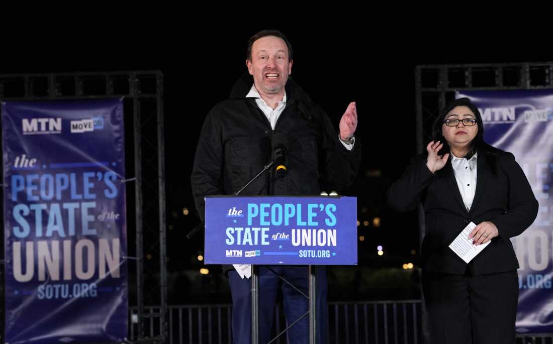 Sen. Chris Murphy, D-Conn., speaks during the "People's State of the Union" on the National Mall on Tuesday night.