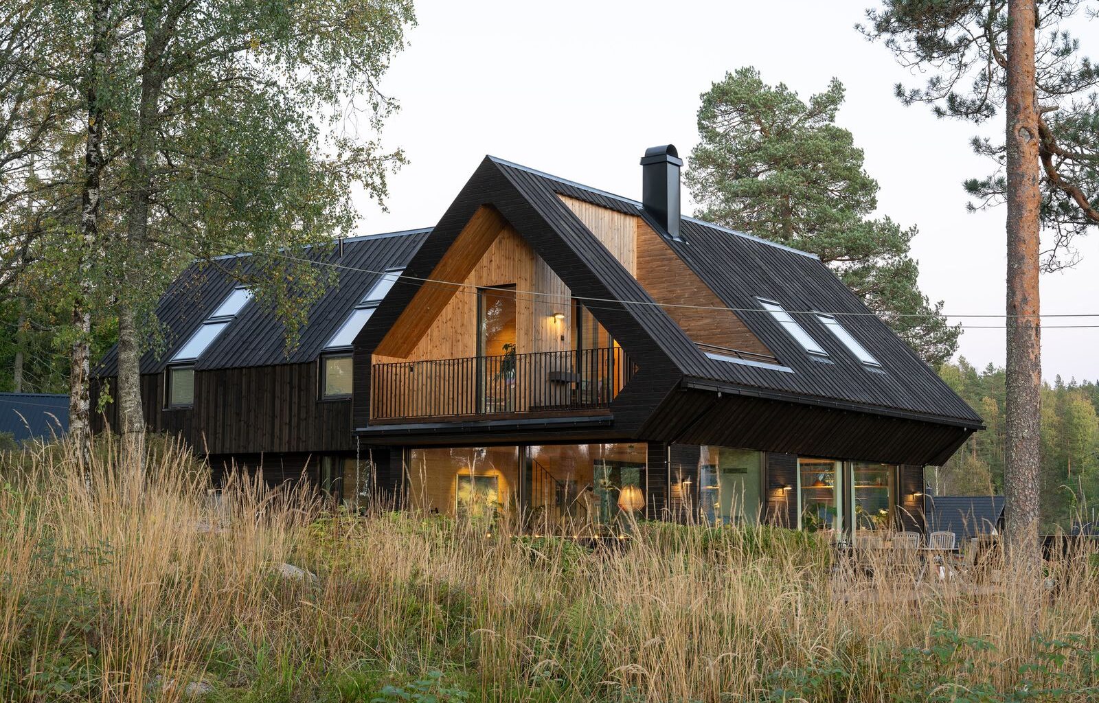The Roof at This Norwegian Retreat Holds a Surprisingly Roomy Second Level