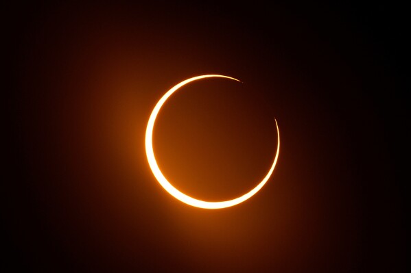 The moon moves in front of the sun during an annular solar eclipse, or ring of fire, seen from San Antonio, on Saturday, Oct. 14, 2023. (AP Photo/Eric Gay, File)