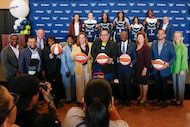 The Dallas Wings 2025 draft class and team officials pose for photos with Dallas officials...