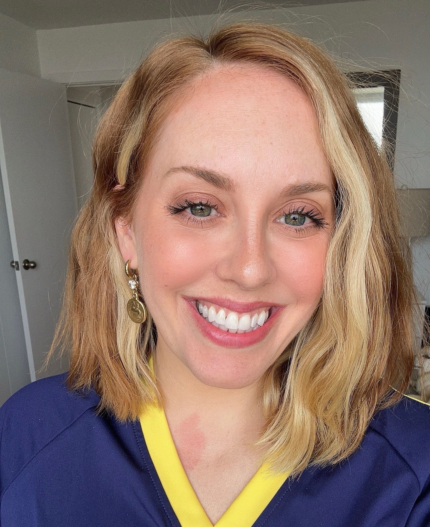 Woman wearing a purple shirt.