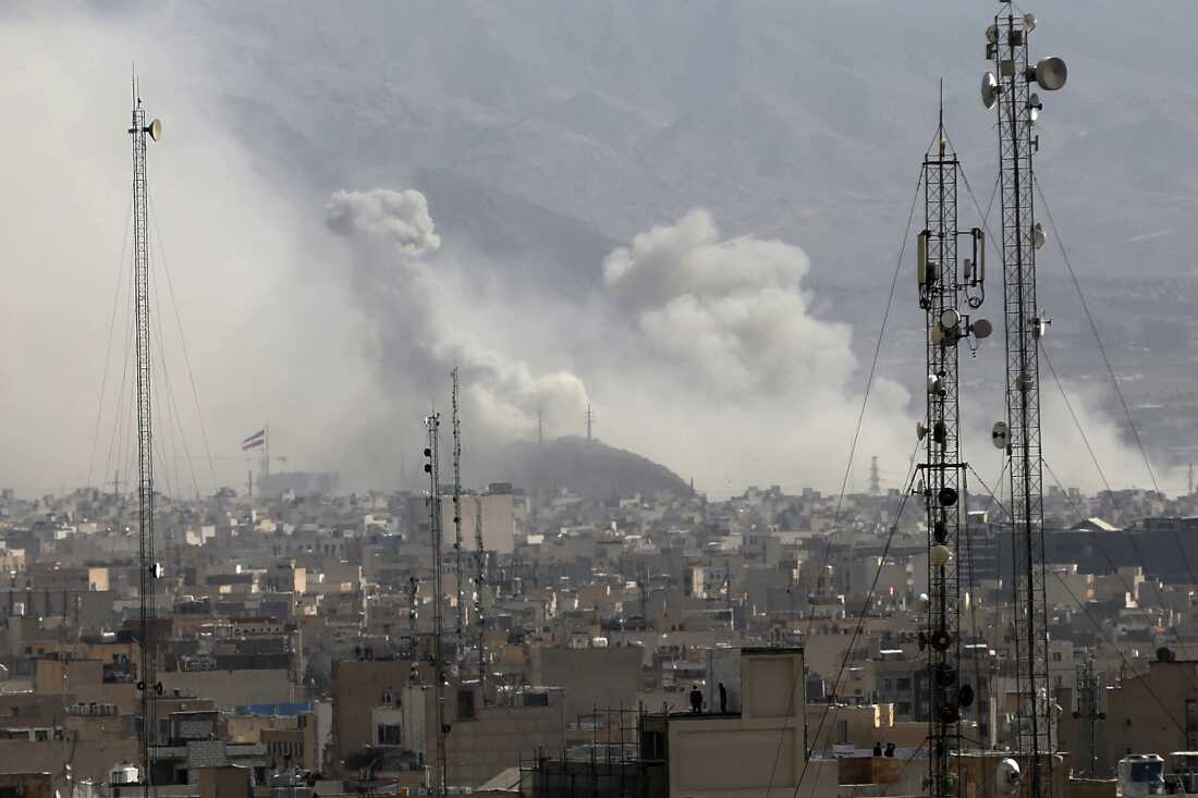 Smoke rises over Tehran after Israel launched airstrikes on Iran on Saturday.