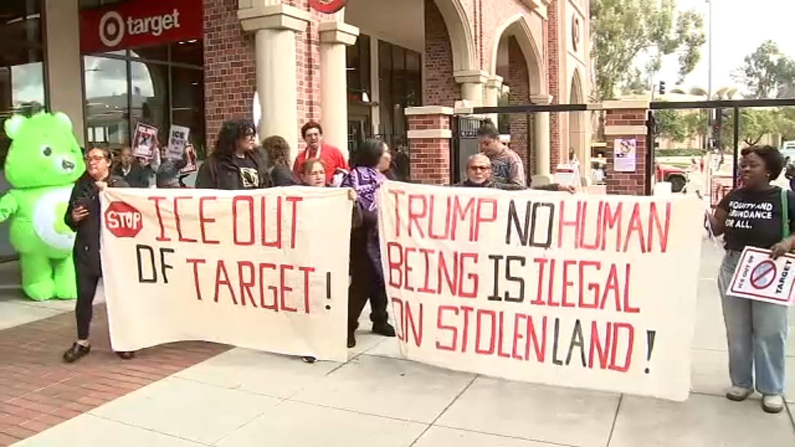 Protesters march through Target store at USC Village to denounce ICE actions and demand store ban agents from store properties