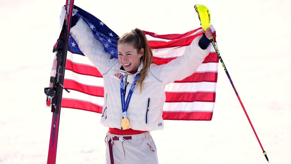 United States' Mikaela Shiffrin poses with the gold medal of an alpine ski, women's slalom race, at the 2026 Winter Olympics, in Cortina d'Ampezzo, Italy, Wednesday, Feb. 18, 2026.