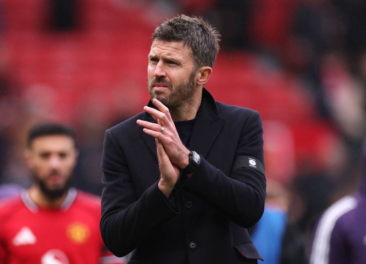 Michael Carrick, Manager of Manchester United, celebrates victory during the Premier League match between Manchester United and Tottenham Hotspur at Old Trafford on February 07, 2026 in Manchester, England.