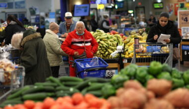 Customers shop for groceries in Walmart Supercenter retail store in North Bergen, New Jersey