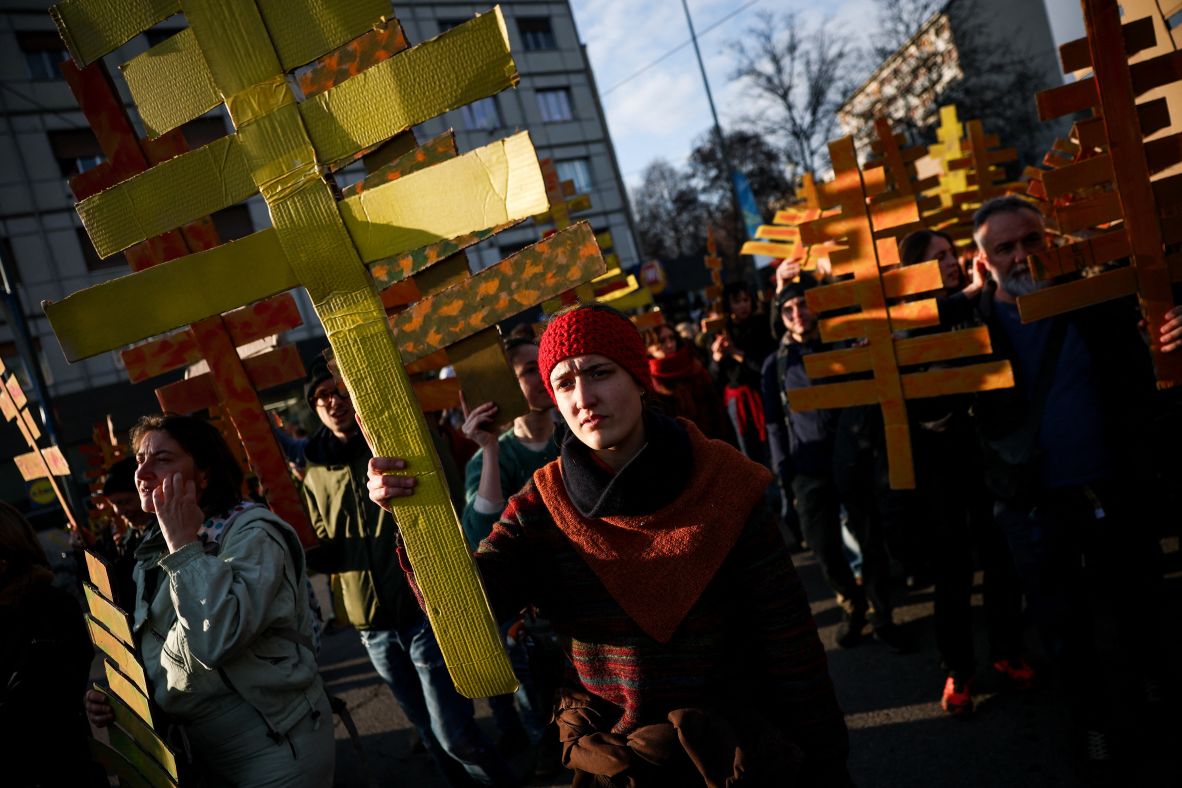 Demonstrators in Milan protest the environmental, economic and social impacts of the Winter Olympics.
