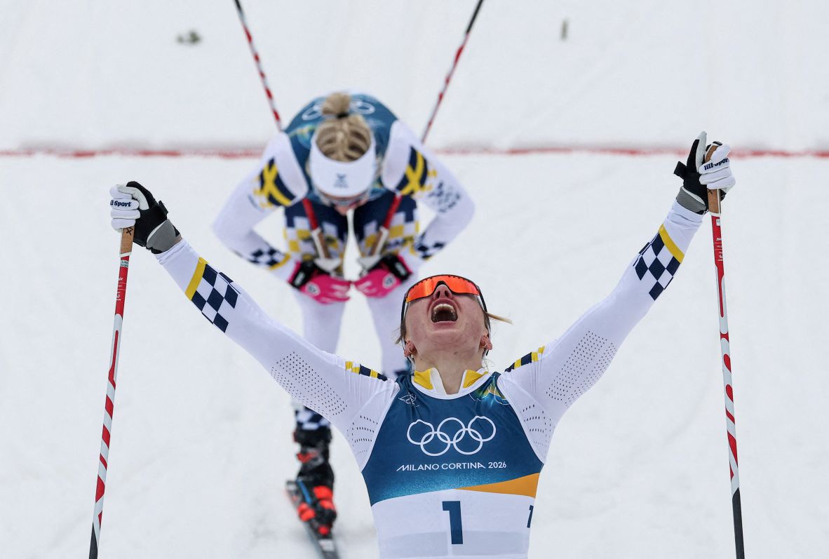 Linn Svahn of Sweden celebrates winning gold in the cross-country sprint classic on February 10. Svahn led a <a href=