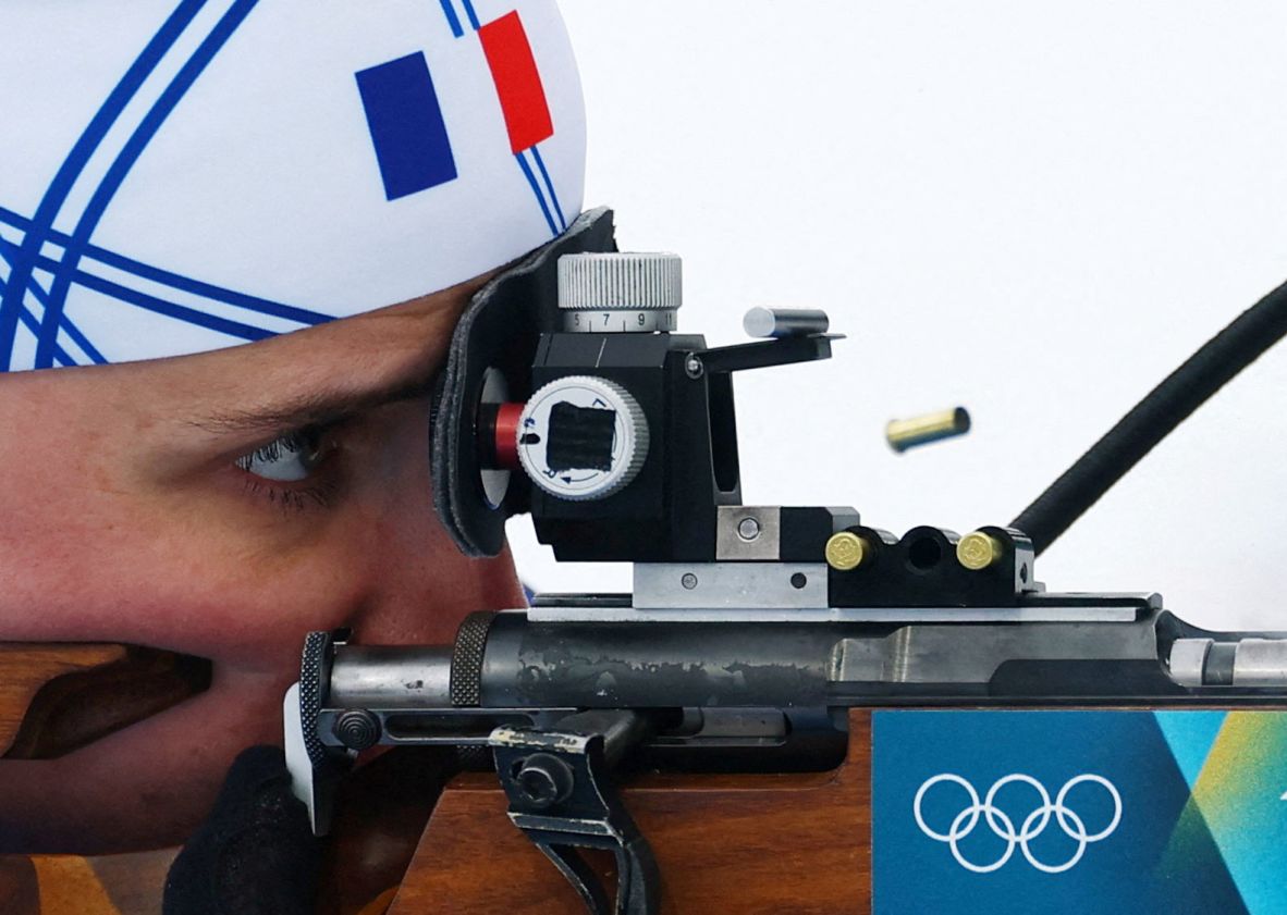 France's Julia Simon fires her rifle during the 15km biathlon on February 11. <a href=