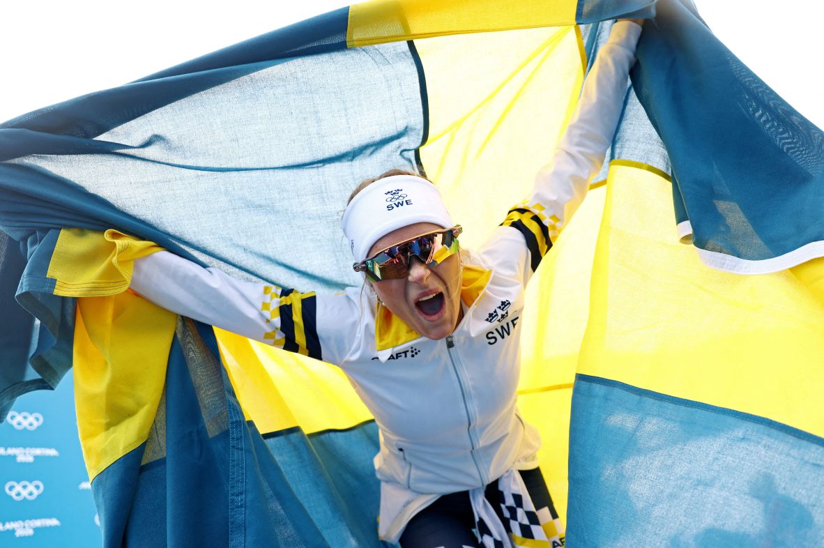 Sweden's Frida Karlsson celebrates February 12 after <a href=