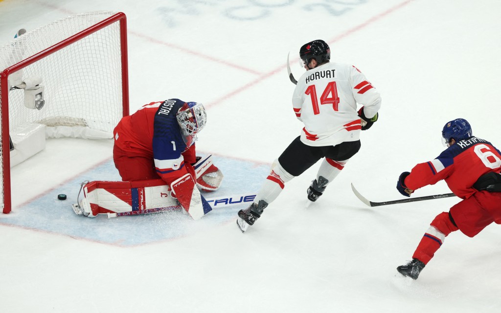 Canadian player Bo Horvat scores a goal against Czechia during a preliminary round ice hockey match.
