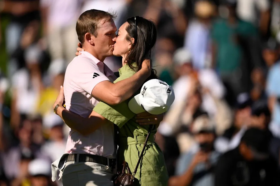 Jacob Bridgeman kisses wife Haley after winning the Genesis Invitational on Feb. 22, 2026. Getty Images