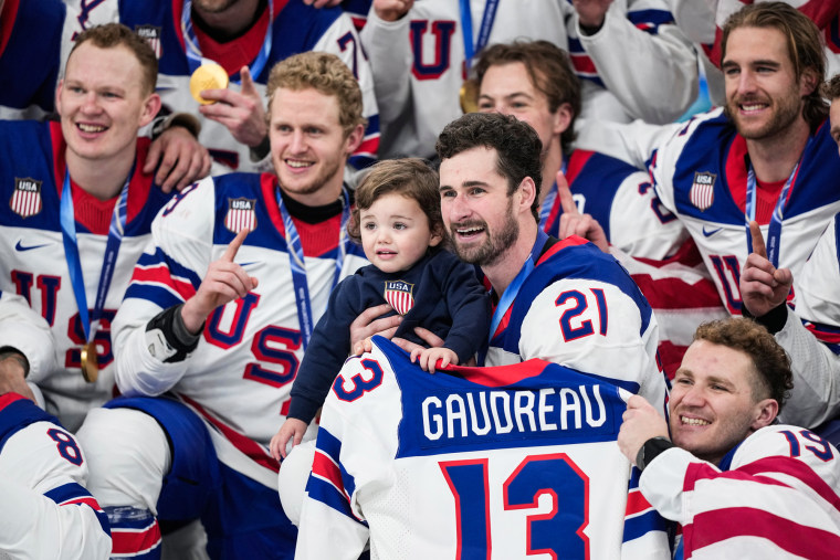 Hockey players gather for a portrait