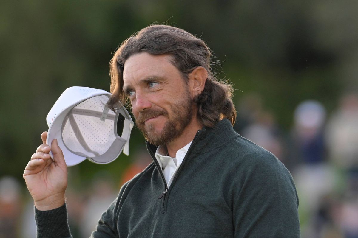 Tommy Fleetwood of England reacts to the crowd on the 18th green during the second round of The Genesis Invitational 2026 at Riviera Country Club