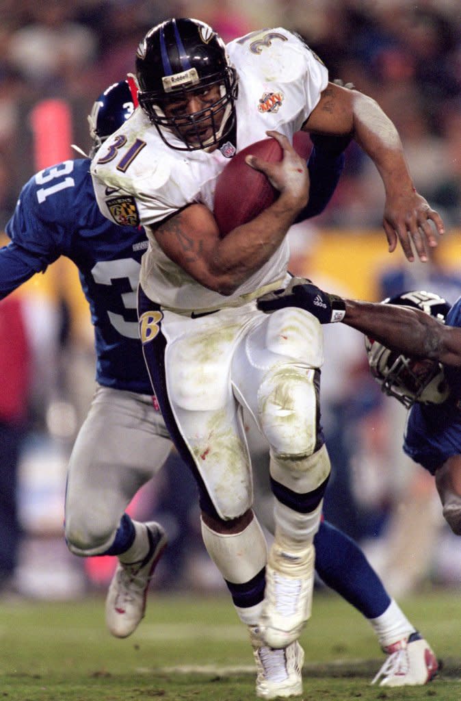 Former Baltimore Ravens running back Jamal Lewis was pardoned after pleading guilty in 2004 to using a cell phone to facilitate a cocaine deal. Getty Images