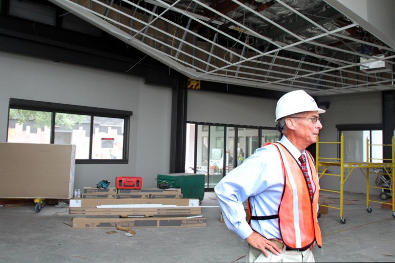 Phil Bobel, Assistant Director of Public Works for the City of Palo Alto, leads a tour of the construction at Mitchell Park Library and Community Center, including the teen center pictured here.  Photo taken June 24, 2013 by Veronica Weber.