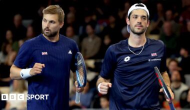 Julian Cash and Lloyd Glasspool celebrate