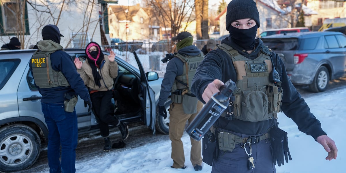 Immigration agents draw guns, arrest activists following them in Minneapolis