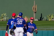 Texas Rangers infielder Cameron Cauley (right) celebrates with catcher Cooper Johnson after...