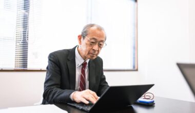 Japanese companies are paying older workers to sit by a window and do nothing—while Western CEOs demand super-AI productivity just to keep your job