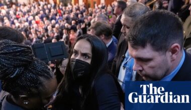 Ilhan Omar guest arrested for standing at Trump’s State of the Union address | State of the Union address