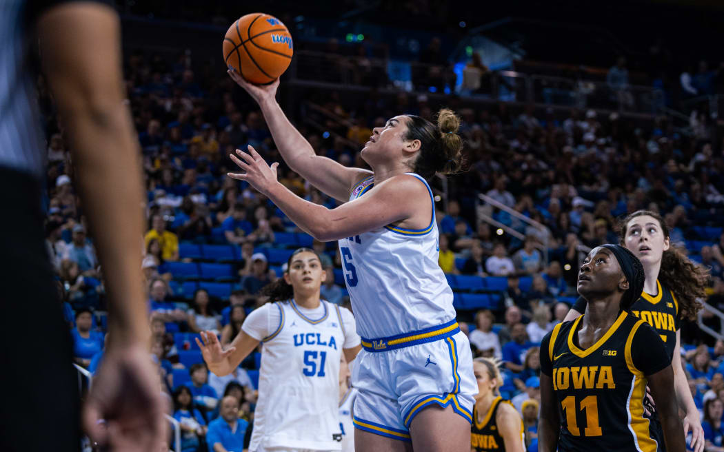 Charlisse Leger-Walker for UCLA.