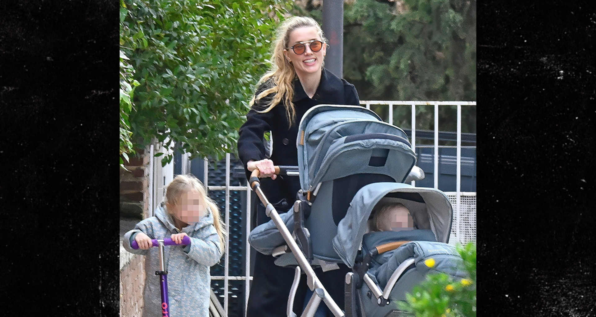 Amber Heard All Smiles as Johnny Depp Films Hollywood Return