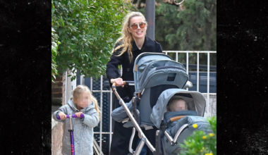 Amber Heard All Smiles as Johnny Depp Films Hollywood Return