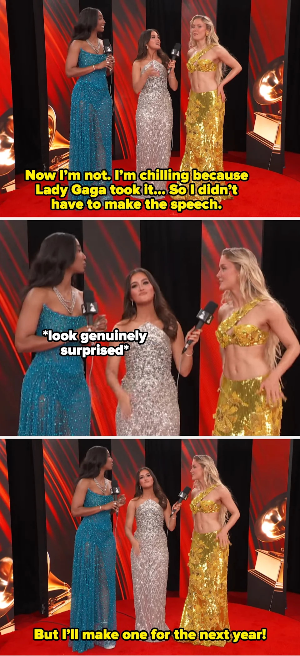 Three people stand on a red carpet, wearing flowing dresses covered in sequins. They are engaged in a conversation, each holding a microphone