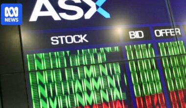 ASX 200 hits new high, Australian dollar climbing after inflation, WiseTech to slash 2,000 jobs — as it happened