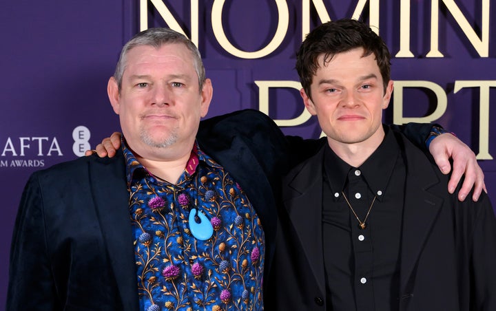 Tourette syndrome advocate John Davidson, here with actor Robert Aramayo, the star of his biopic "I Swear" on Saturday, interrupted the BAFTA Film Awards with several involuntary outbursts on Sunday.