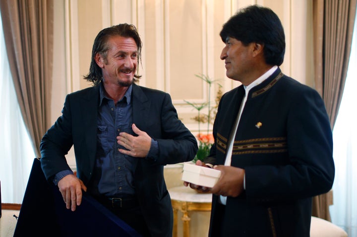 Sean Penn in 2012 talking with Bolivia's then-President Evo Morales.