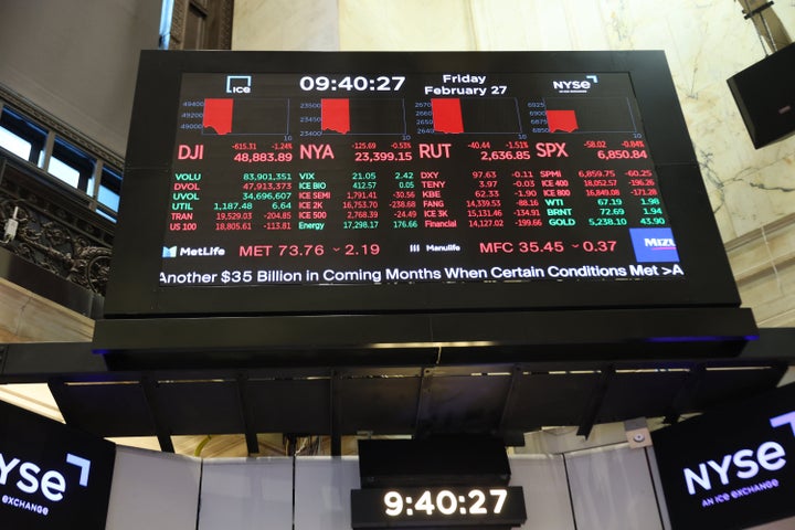 Stock Market numbers are displayed at New York Stock Exchange during morning trading on February 27, 2026 in New York City. (Photo by Michael M. Santiago/Getty Images)