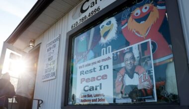 A photo in memory of Carl Henderson, owner of Carl's Cards & Collectibles in Havertown. Henderson passed away suddenly on Jan. 31.