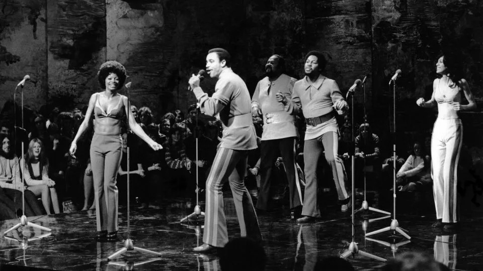 Lamonte McLemore, center, performs on TV with the 5th Dimension. - David Redfern/Redferns/Getty Images