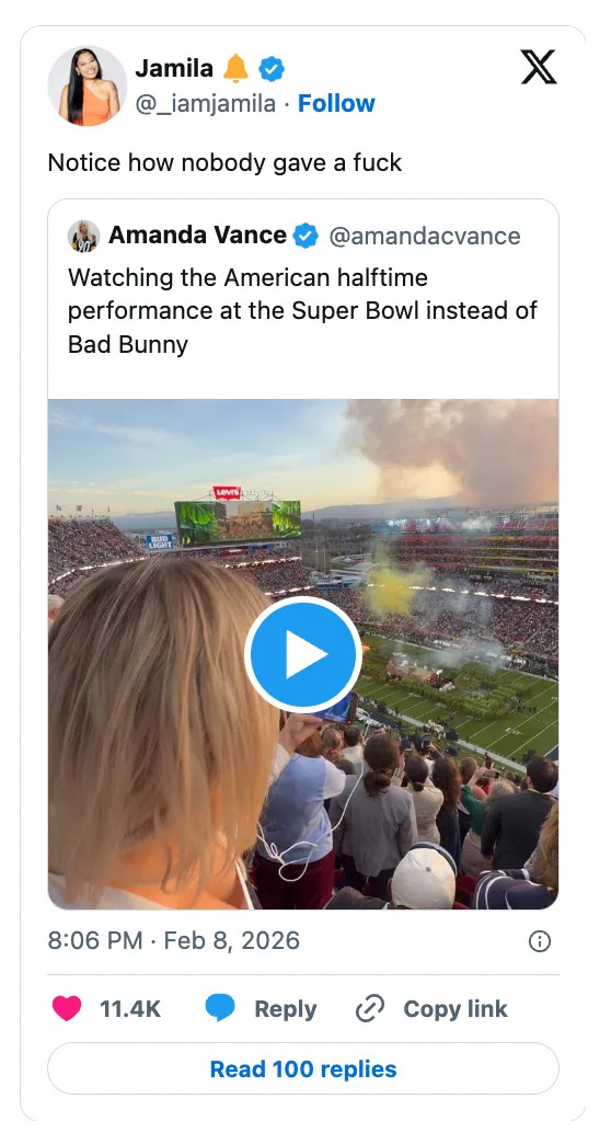 Tweet showing a football stadium during halftime at the Super Bowl, with fans watching